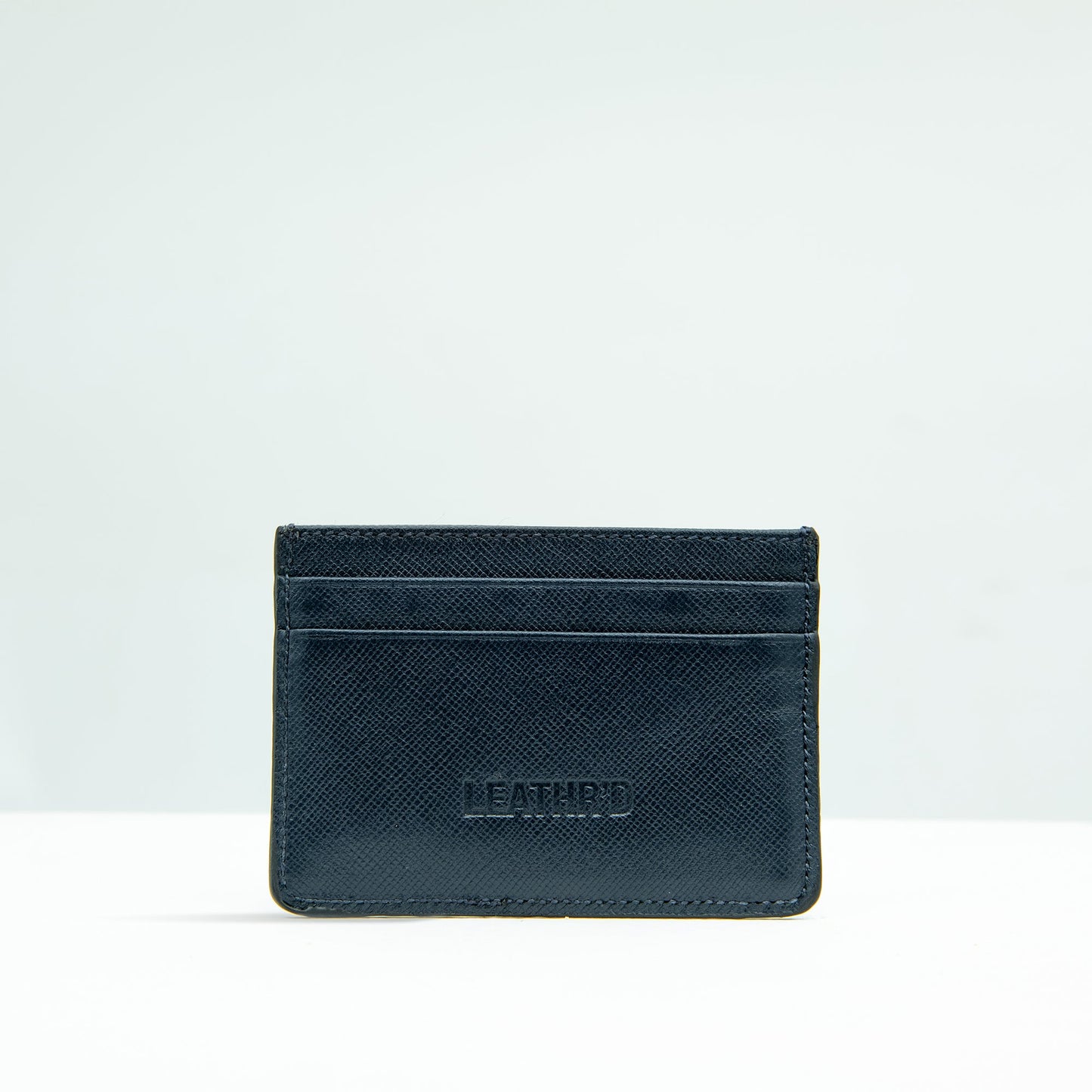 The Dī́jaw Card-holder in Navy