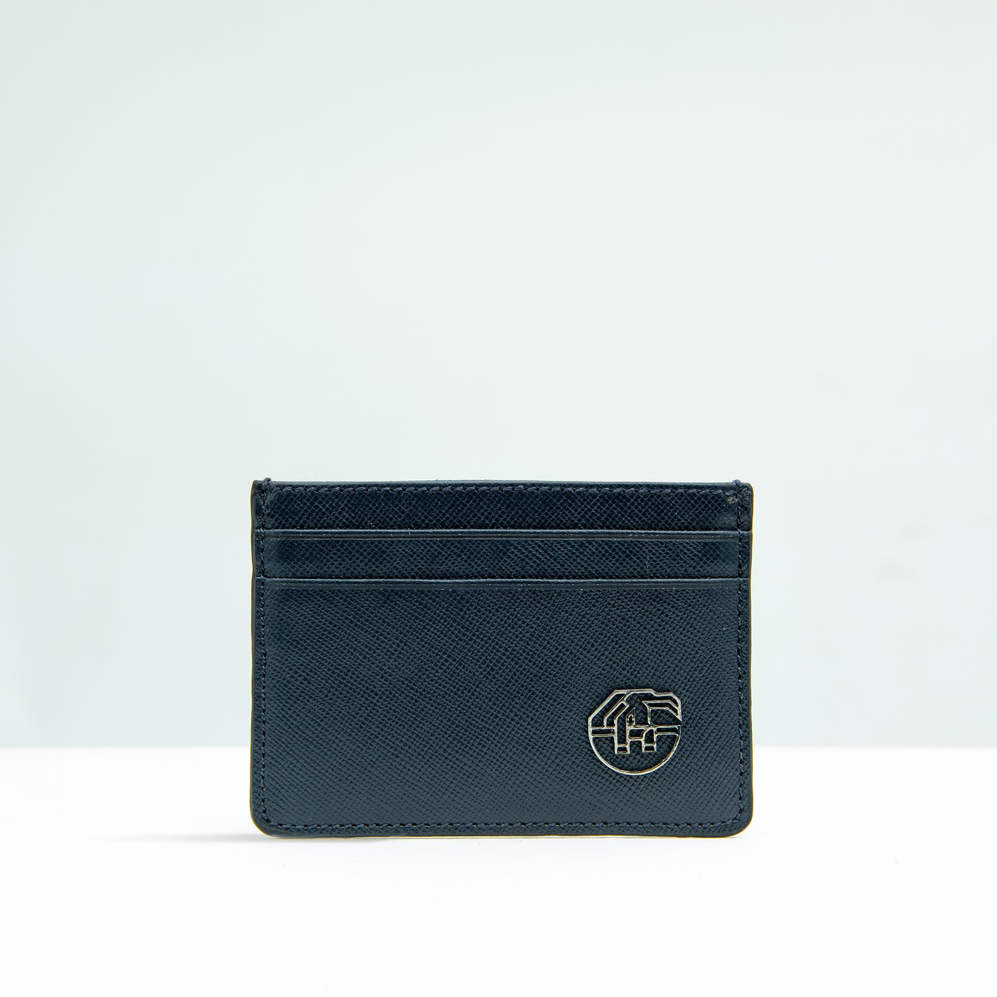 The Dī́jaw Card-holder in Navy
