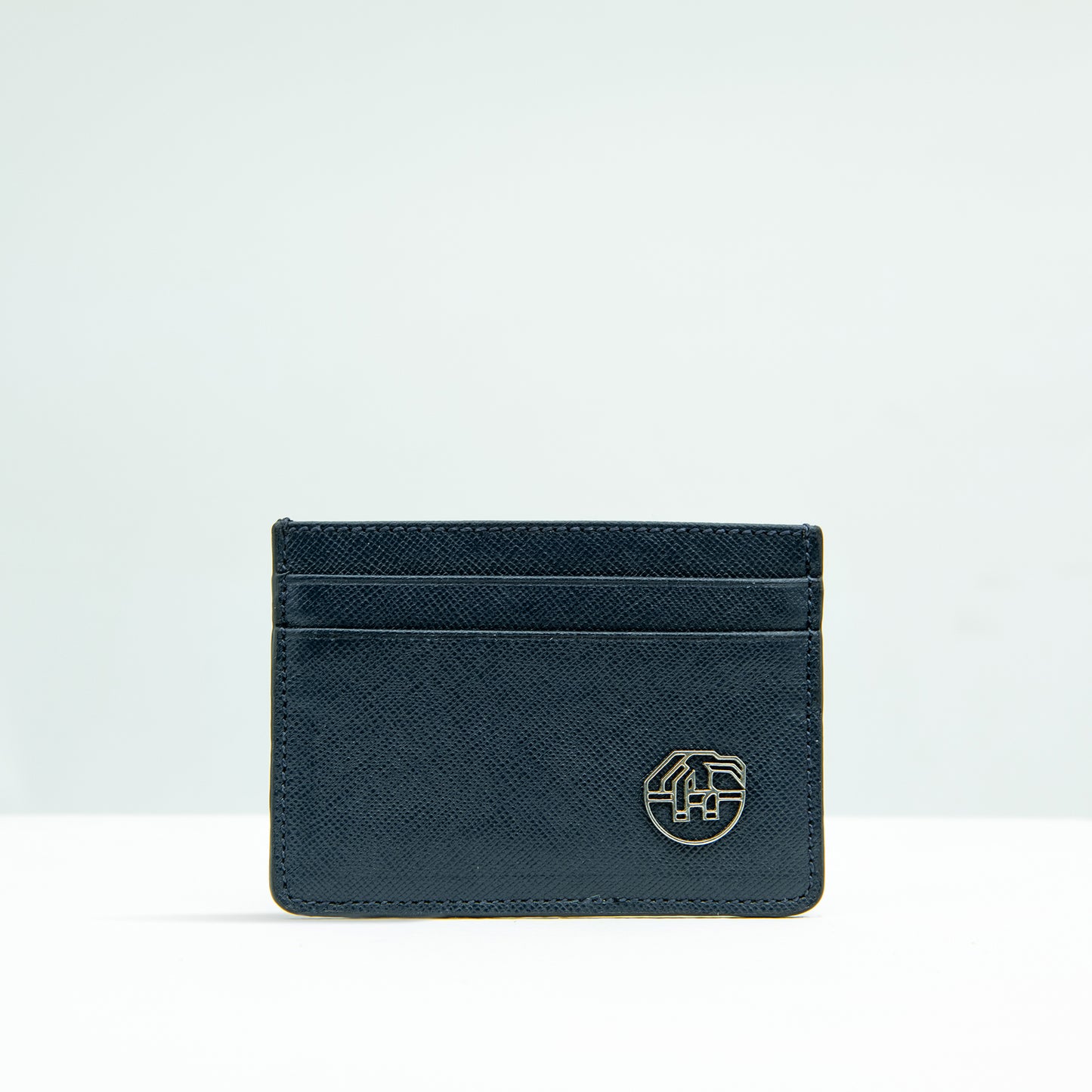 The Dī́jaw Card-holder in Navy